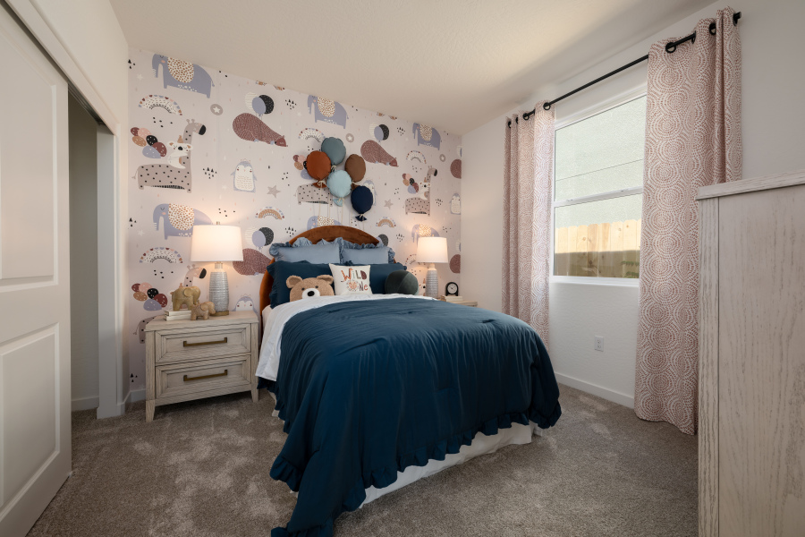 A bedroom with two beds.