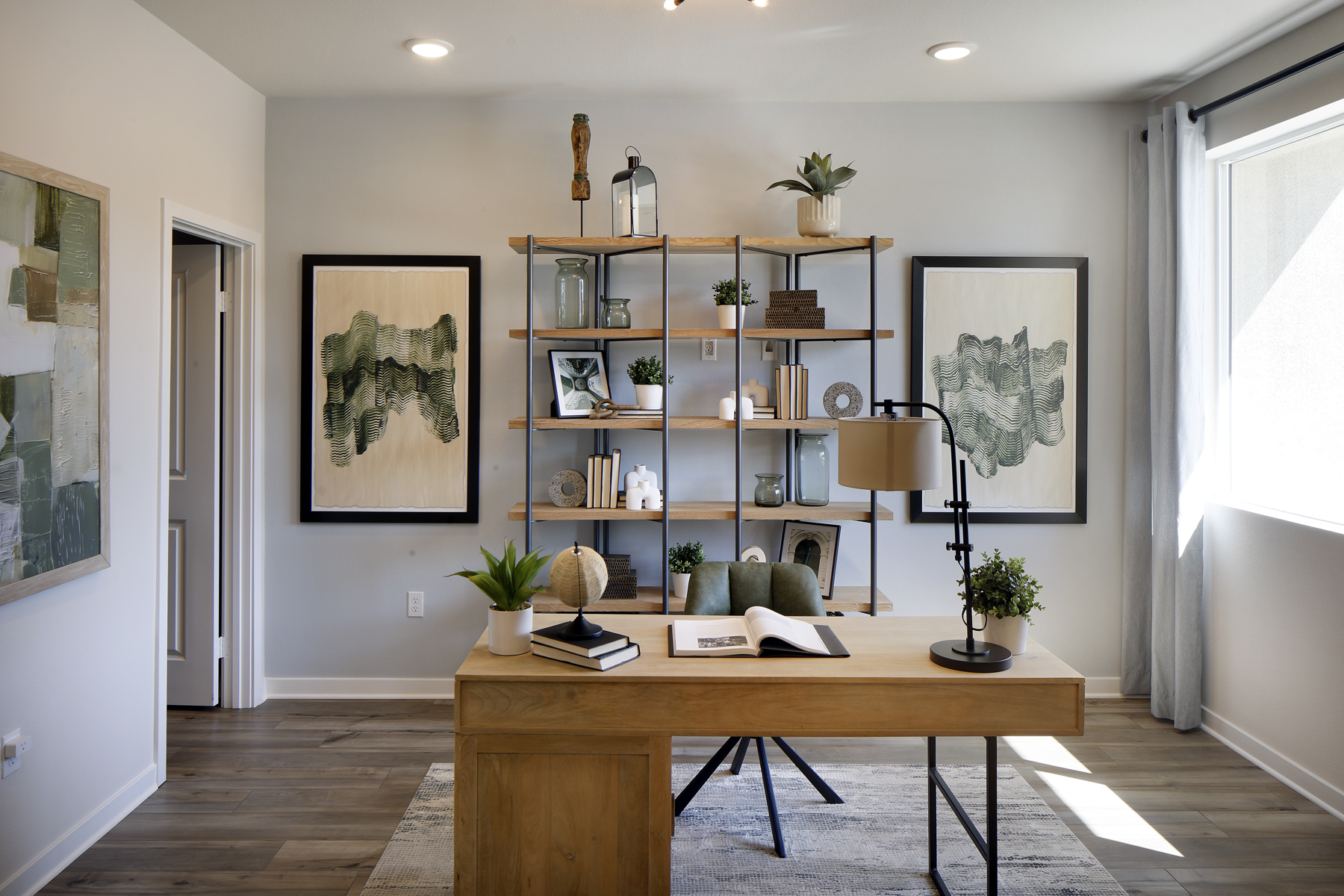 A room with a table and shelves.