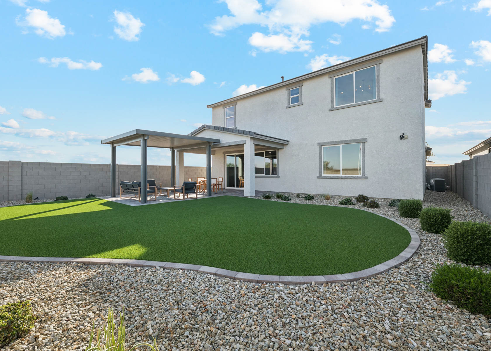 A house with a large front yard.