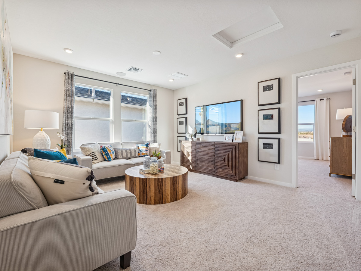 A living room with a large window.
