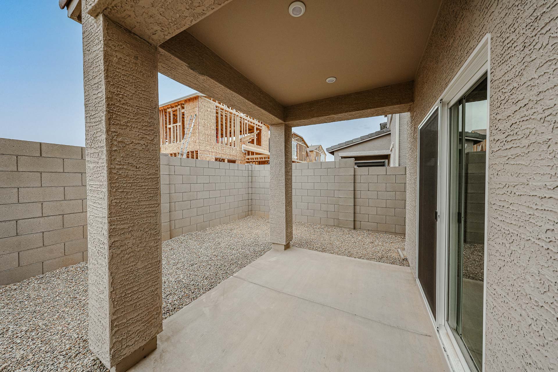A hallway with a stone wall.