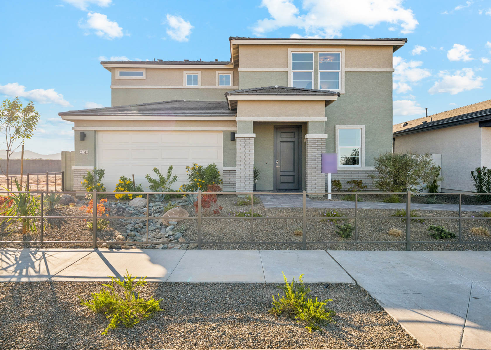 A house with a fence around it.