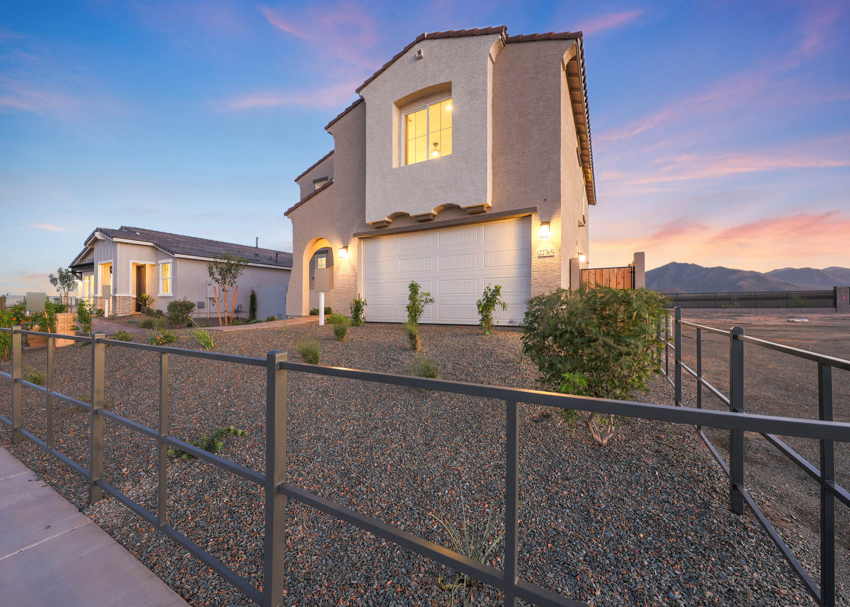 A house with a fence around it.