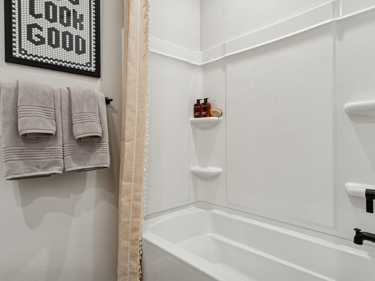A bathroom with a toilet and sink.
