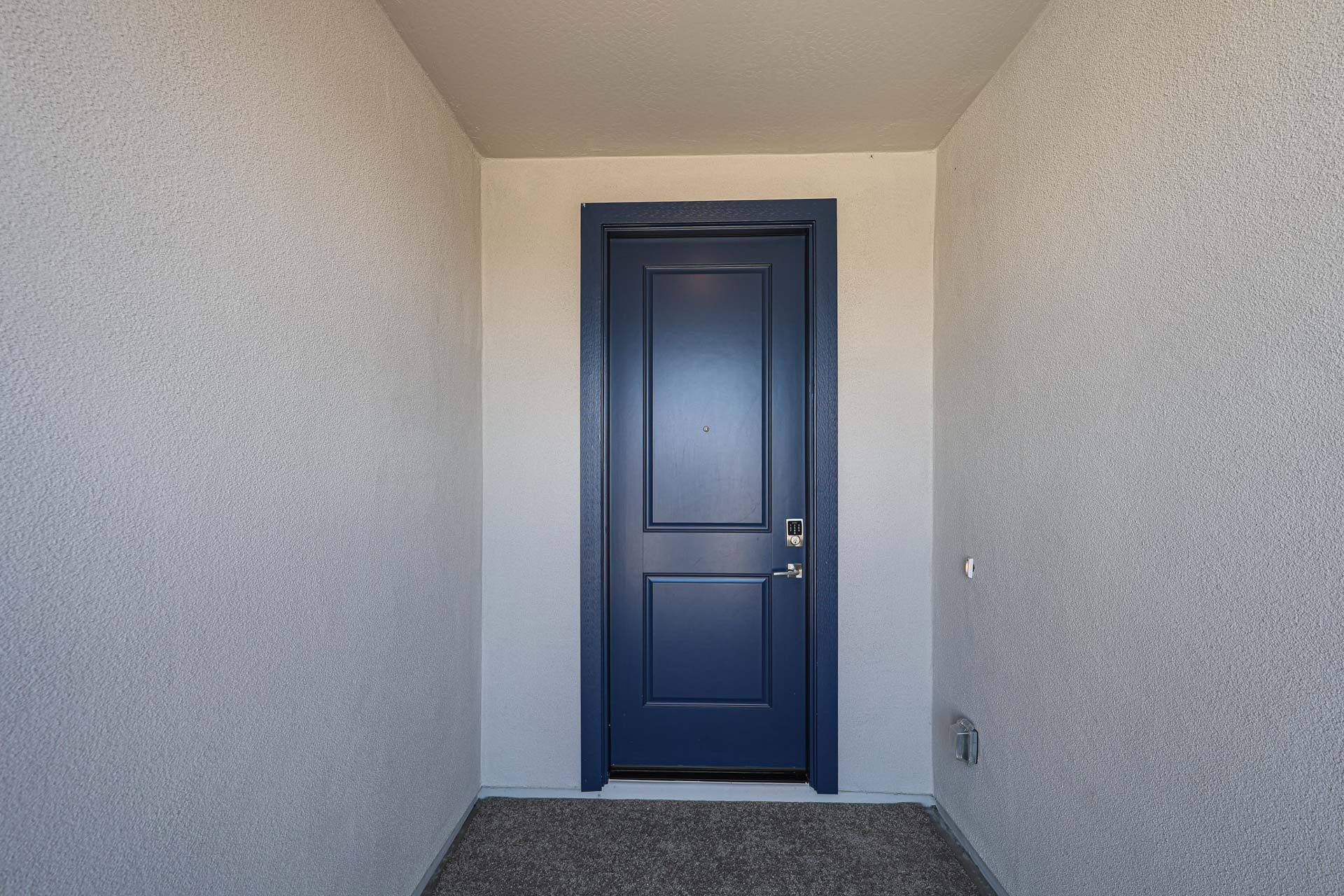 A blue door in a room.