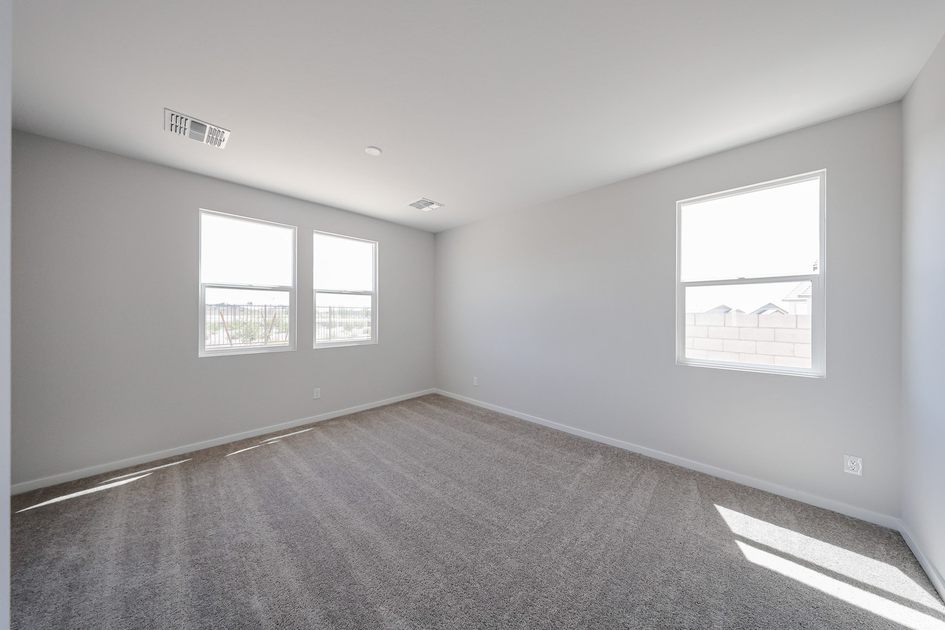 A room with a few windows.