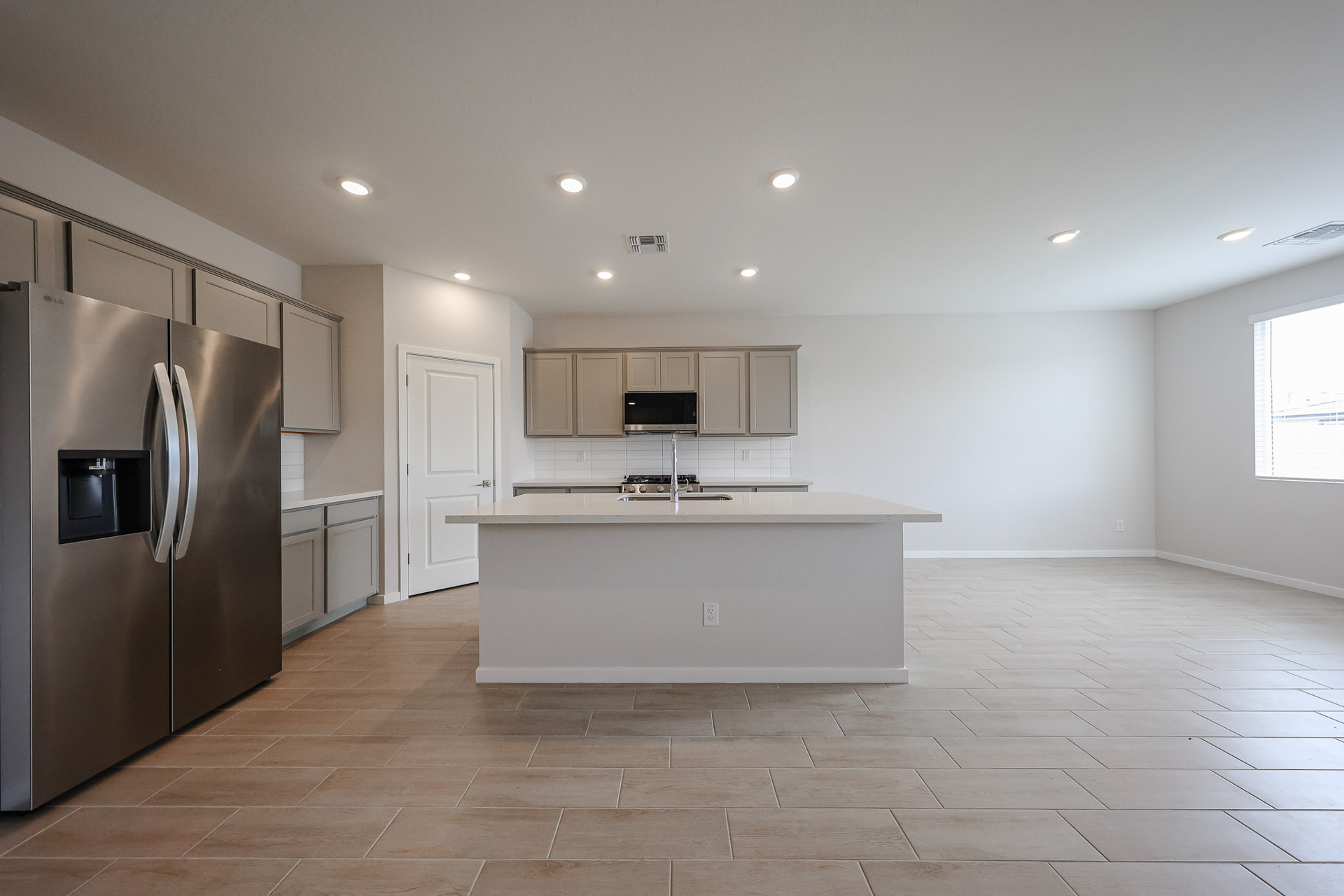 A kitchen with stainless steel appliances.