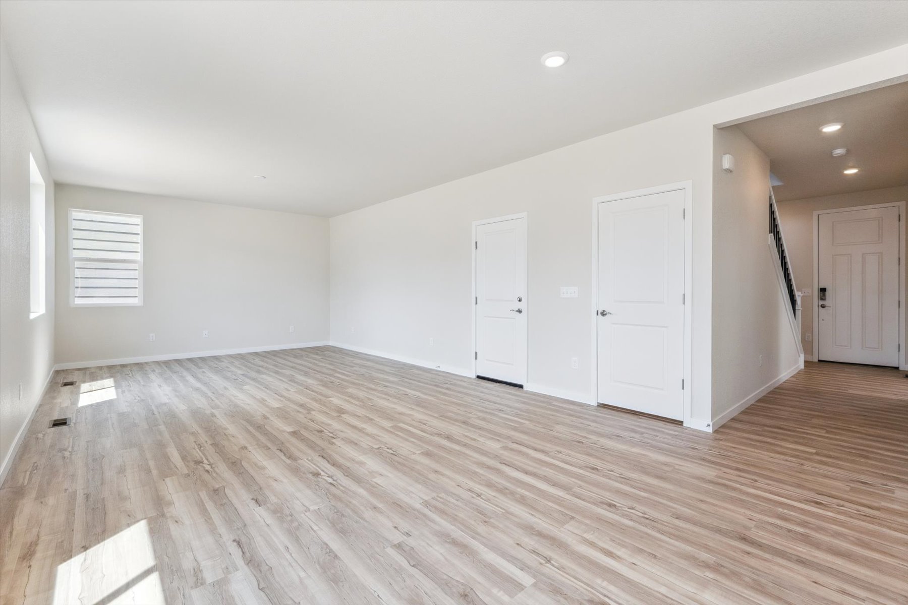 A room with white doors.