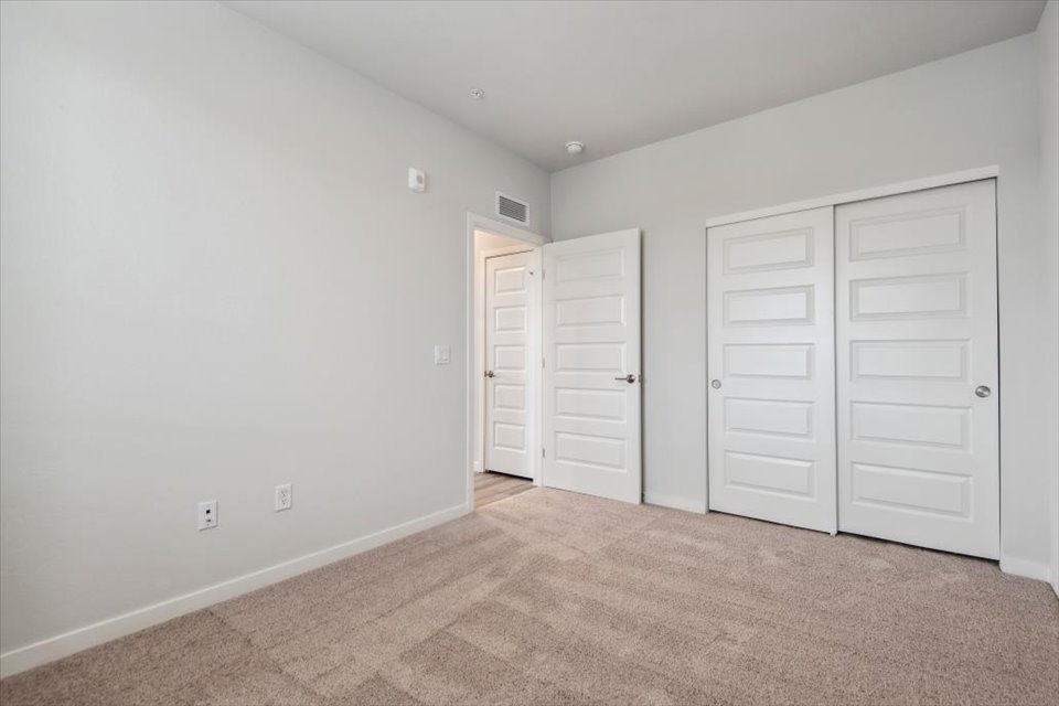 A room with white doors.