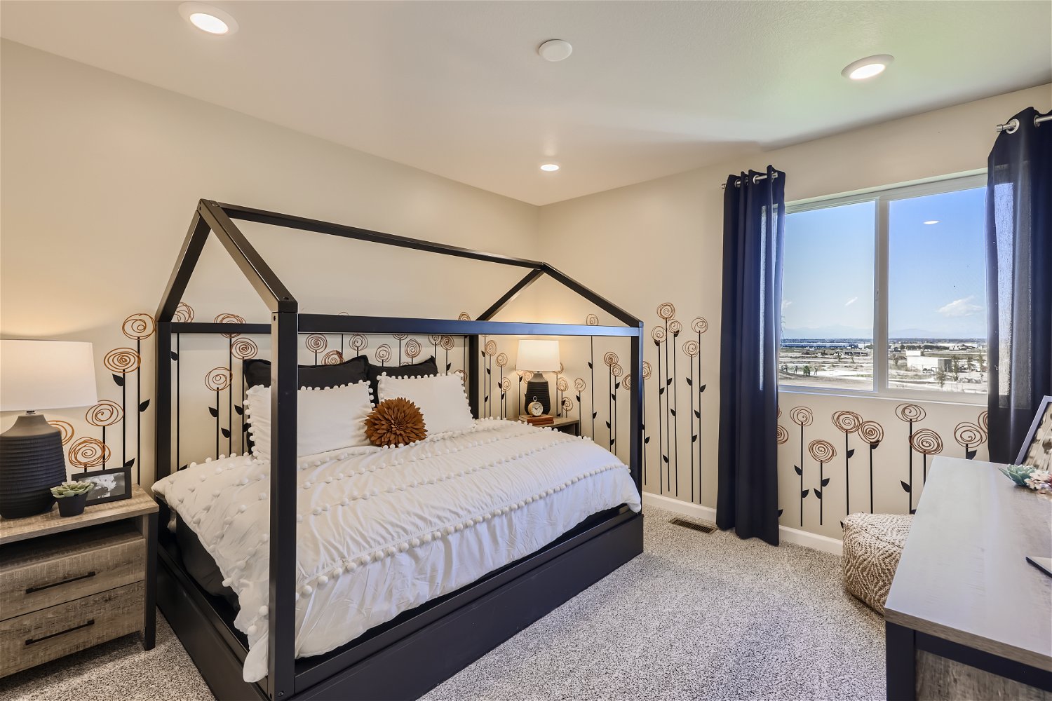 A bedroom with a large bed.