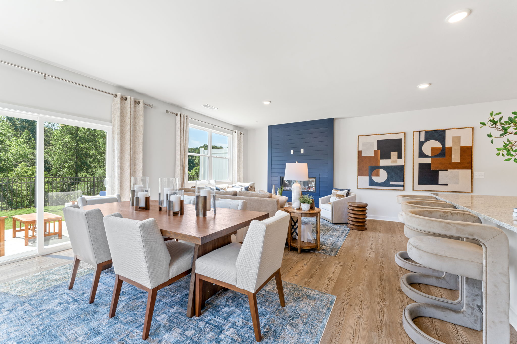 A large dining room with a large table and chairs.