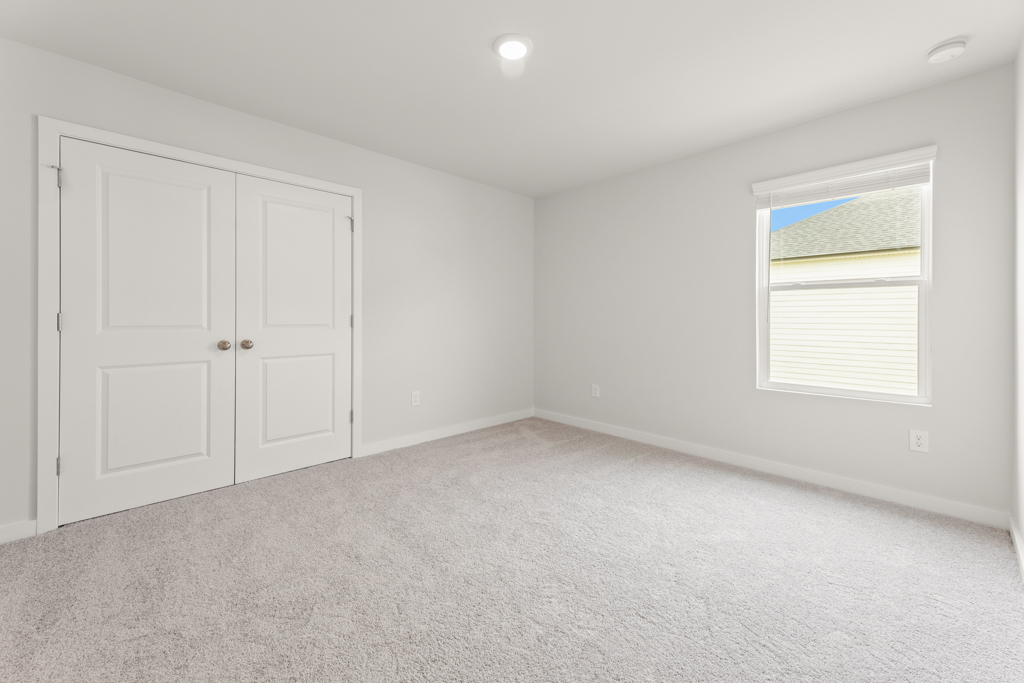 A room with white doors.