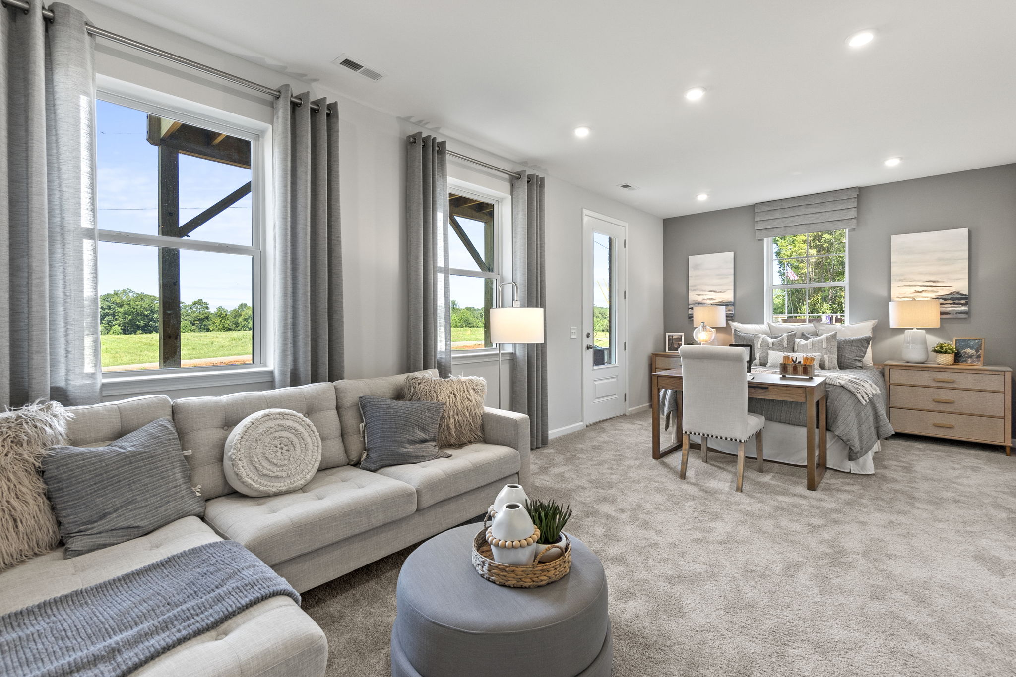 A living room with a large window.