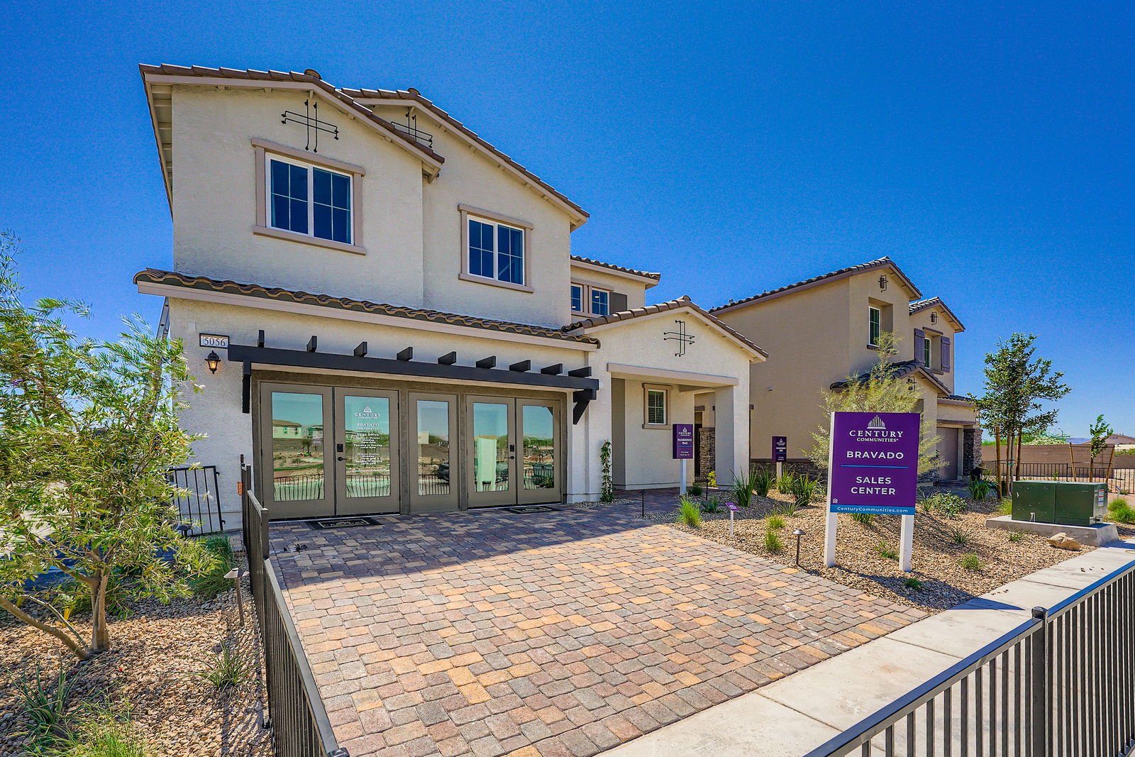 A building with a brick walkway.