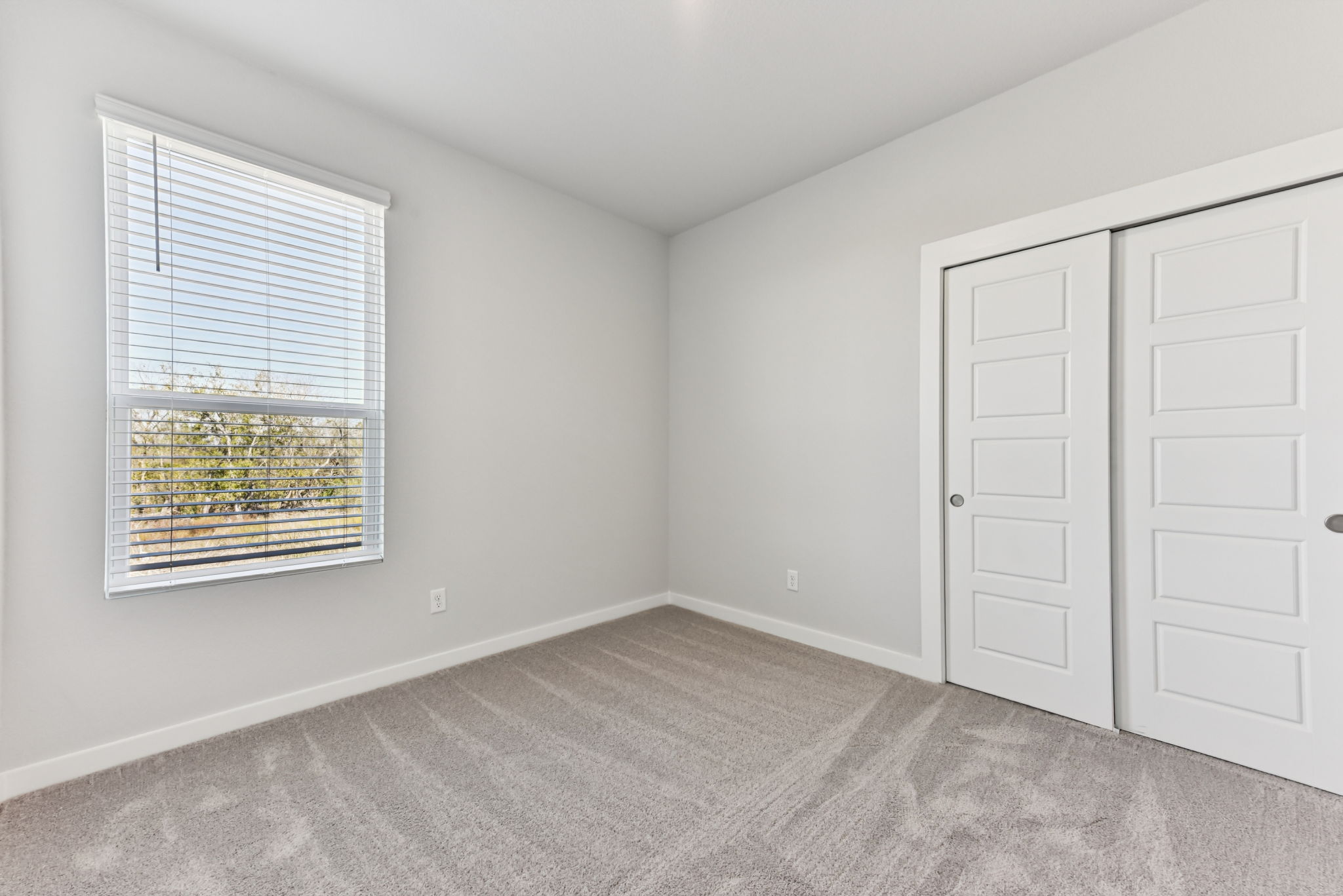 A room with white doors.