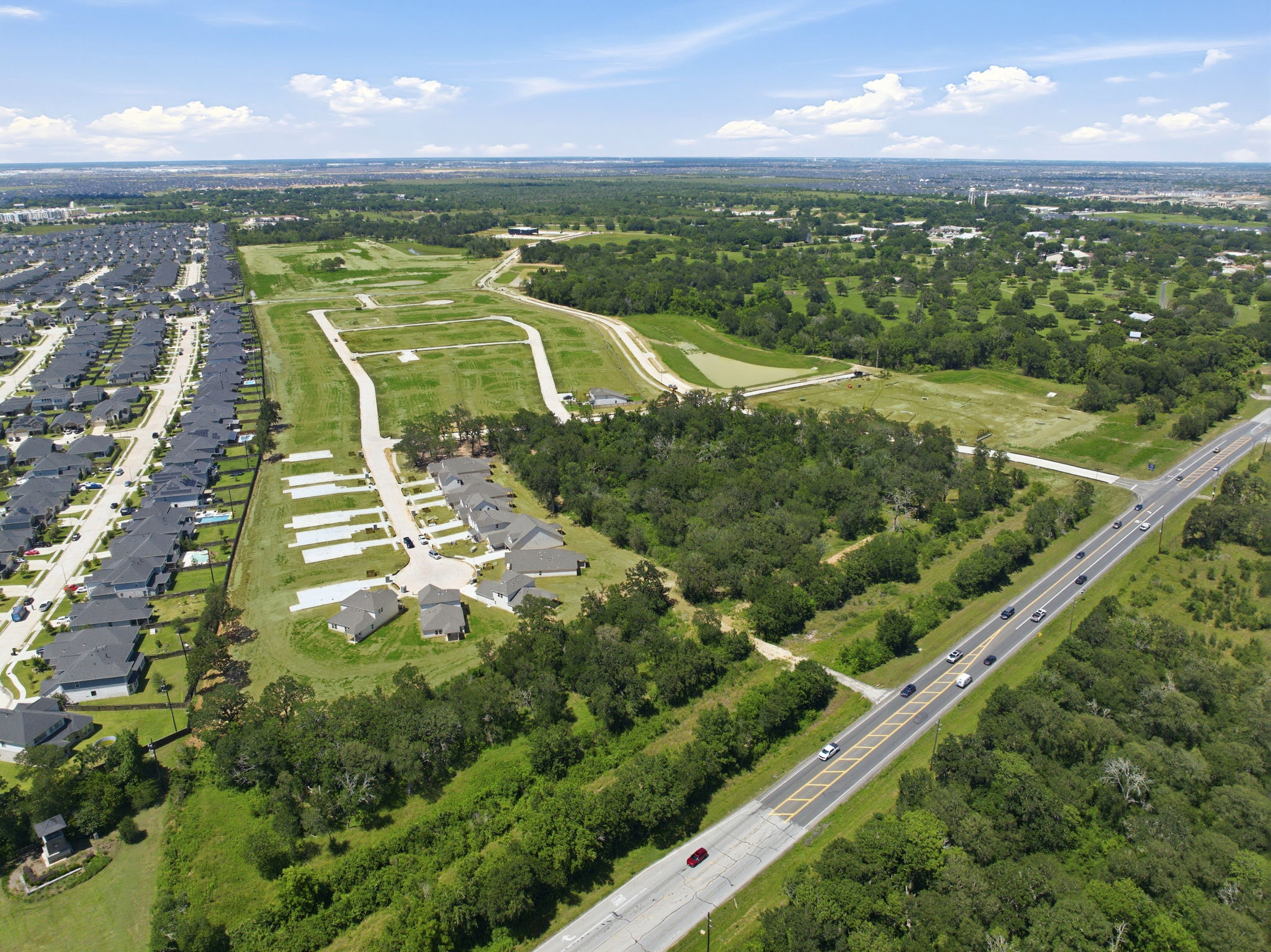 A highway with trees and roads.