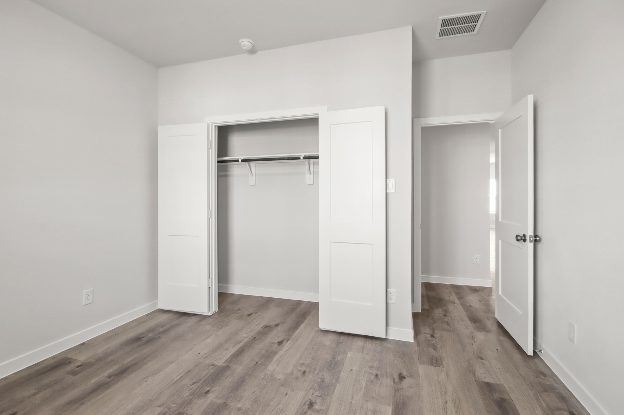 A room with white doors.