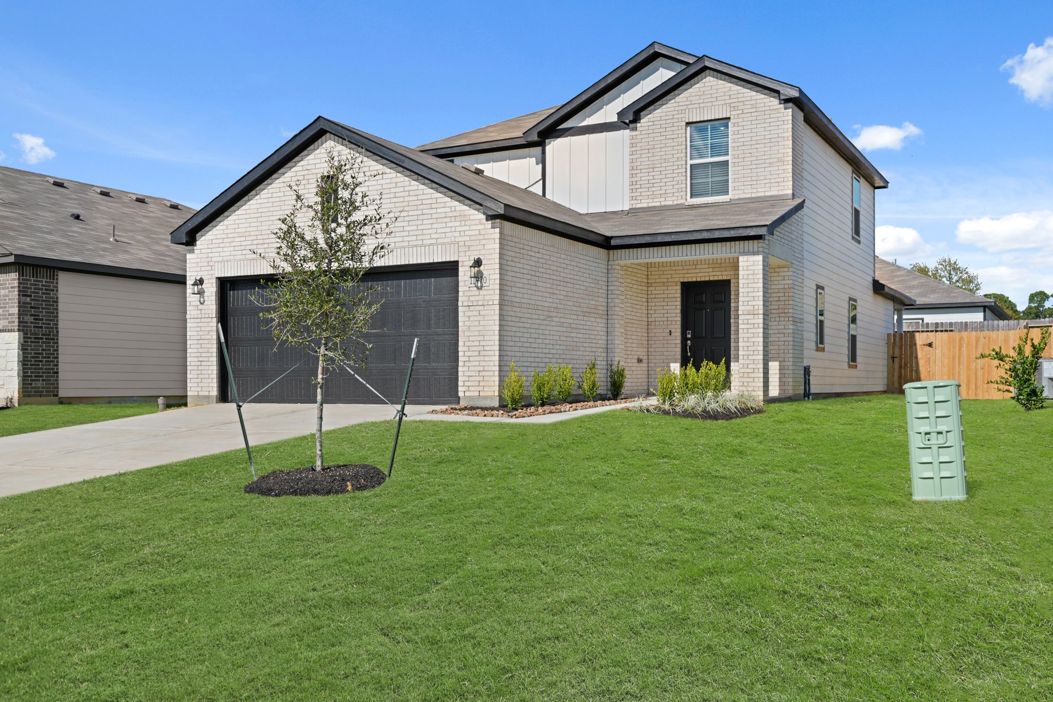 A house with a large front yard.