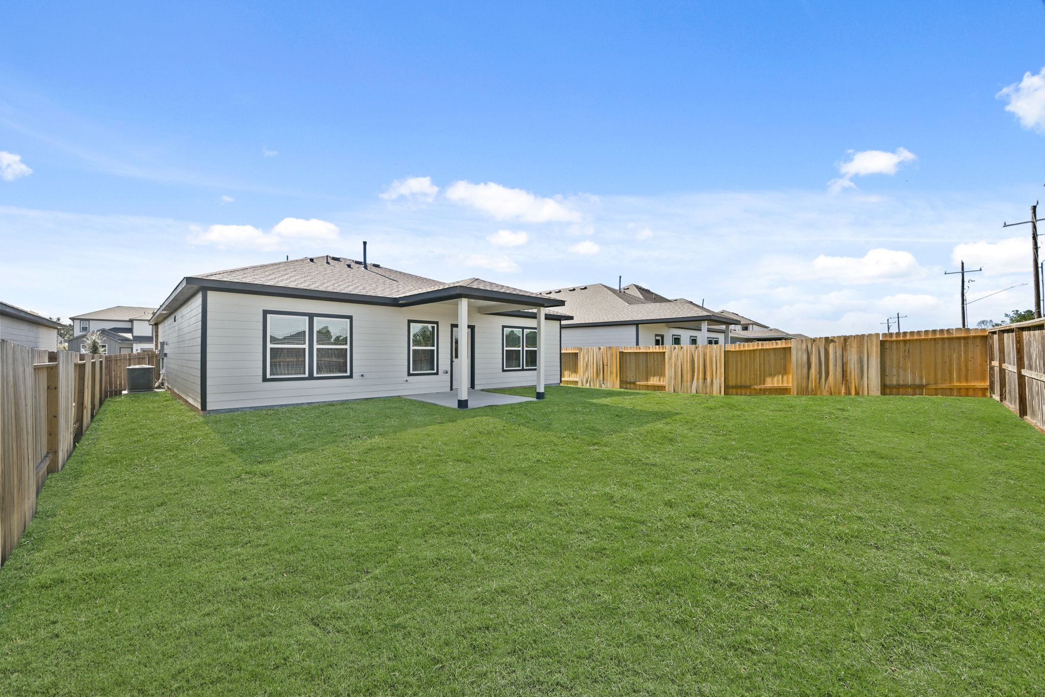 A house with a fence around it.