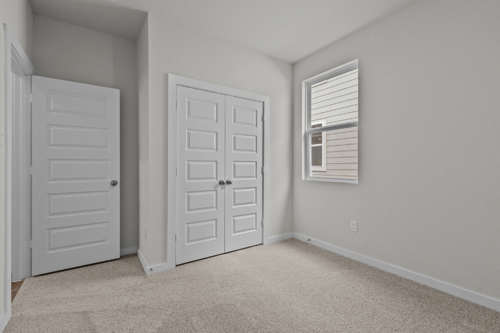 A room with white doors.