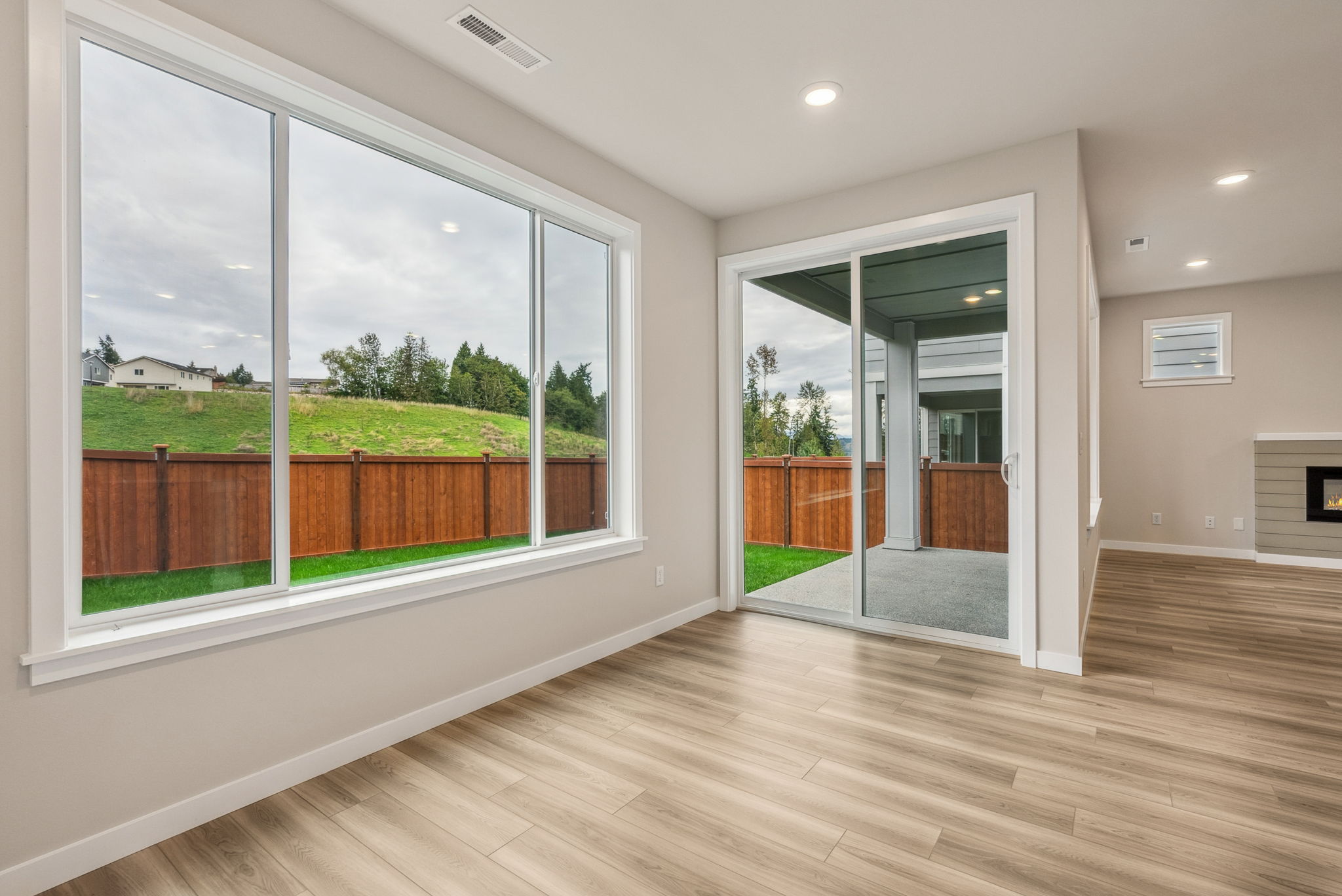 A room with a large glass door.