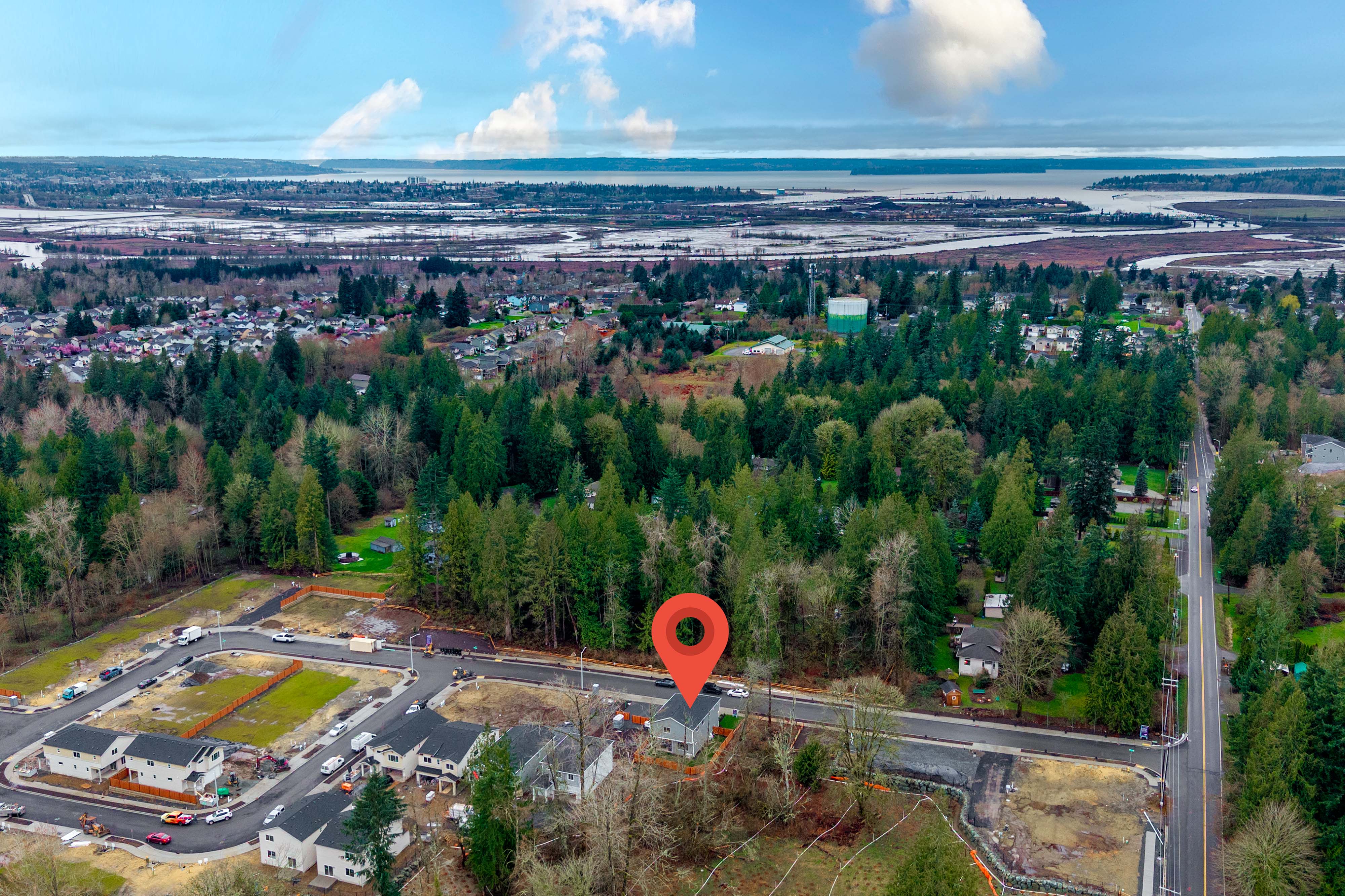 A landscape with trees and buildings.