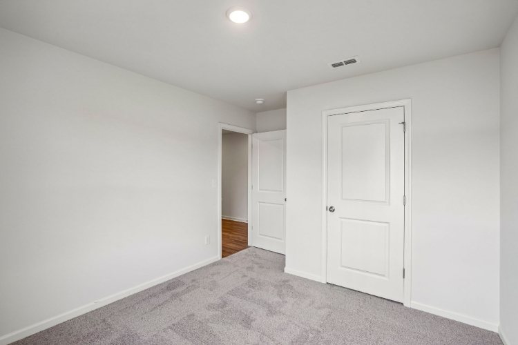 A room with white doors.